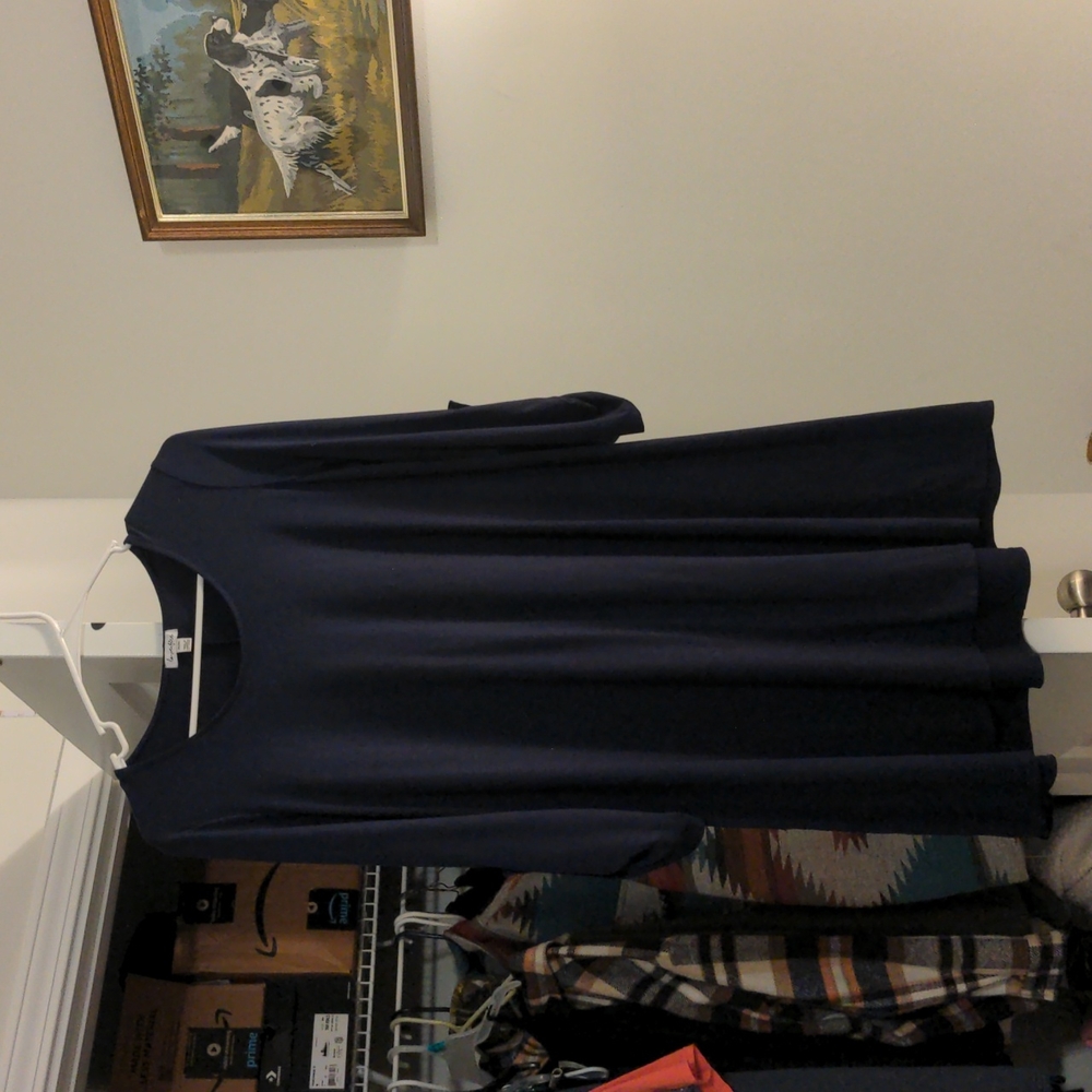 Navy blue dress size Medium but runs slightly big